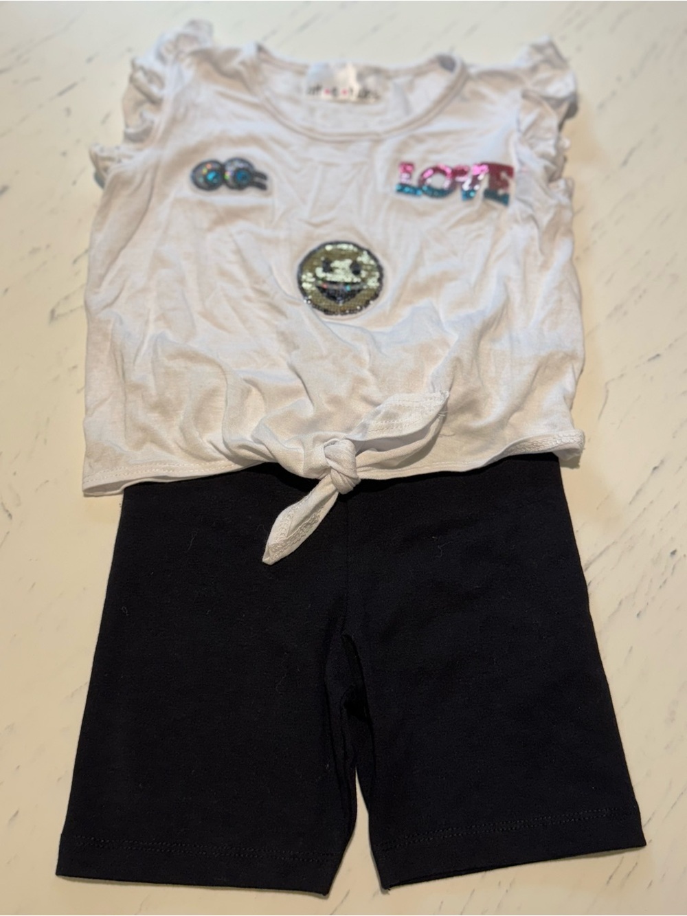 Attitudes White Ruffle Tie Tank w/ Sequin Smiley & love with Black tumble short